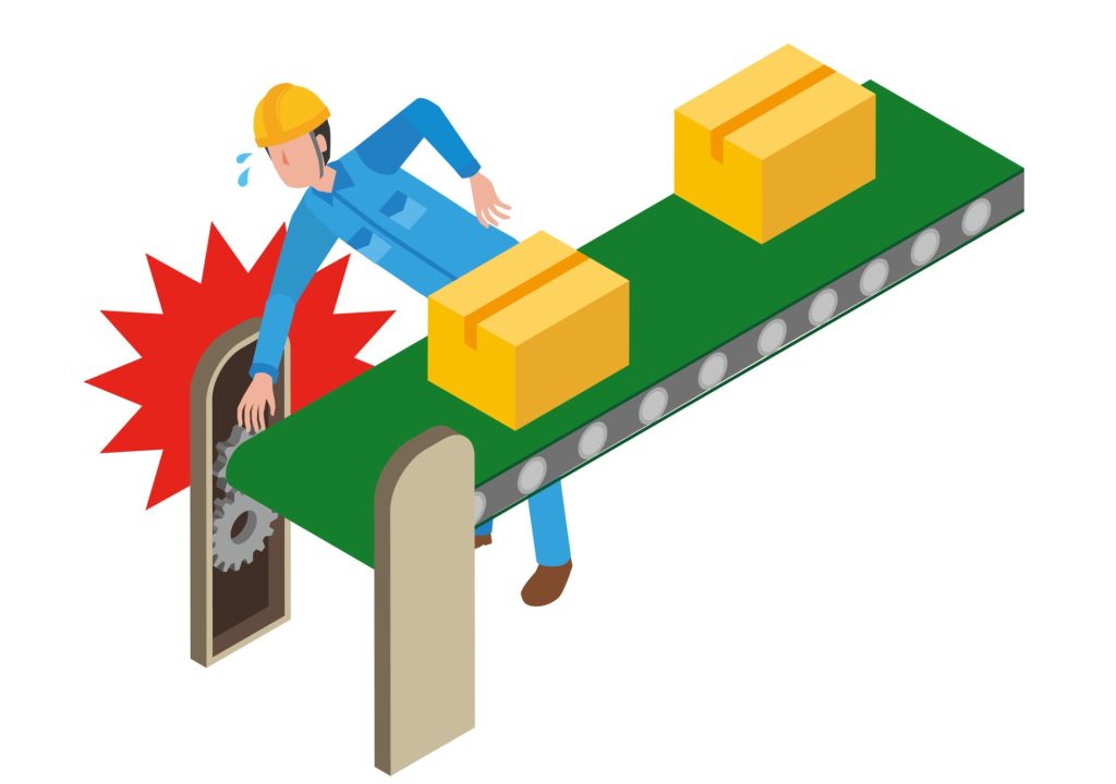 コンベアの駆動部に手を挟まれる男性